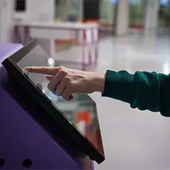 Interactive touch screen booth display for visitor engagement