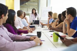 Training staff through live customer interactions