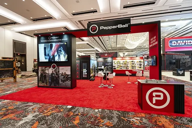 30x30 Custom Exhibit Rental for PepperBall at Shot Show, Designed and Built by Exponents in Las Vegas, NV